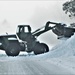 Fort McCoy RTS-Maintenance Soldier moves snow