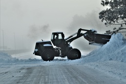 Fort McCoy RTS-Maintenance Soldier moves snow