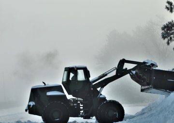 Fort McCoy RTS-Maintenance Soldier moves snow