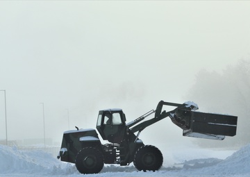 Fort McCoy RTS-Maintenance Soldier moves snow