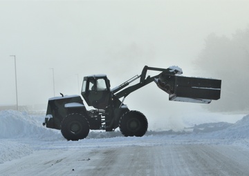 Fort McCoy RTS-Maintenance Soldier moves snow