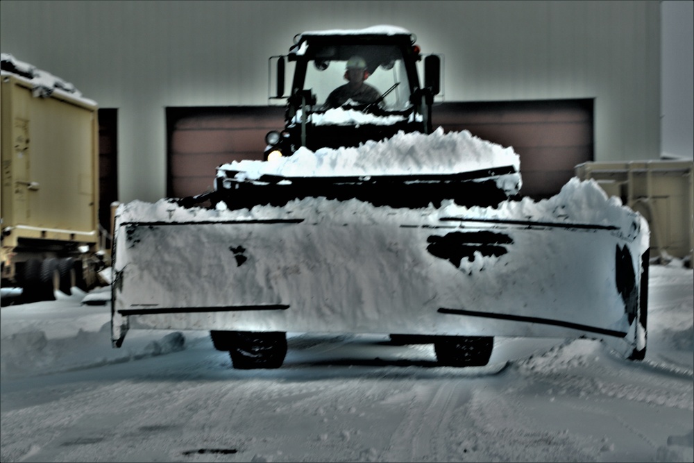 Fort McCoy RTS-Maintenance Soldier moves snow
