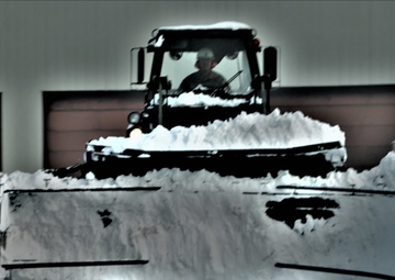 Fort McCoy RTS-Maintenance Soldier moves snow
