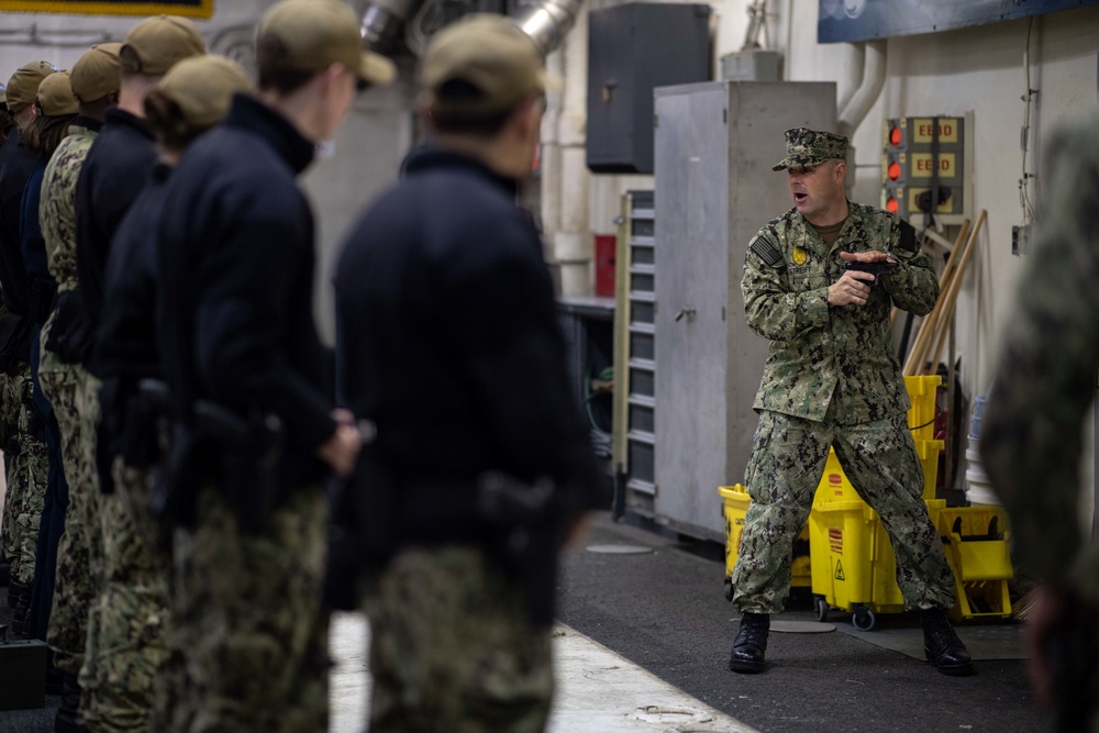 U.S. Sailors participate in a dry-fire exercise