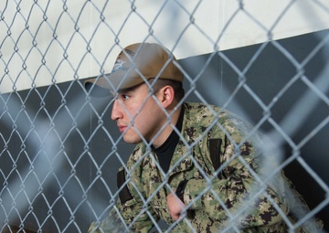 U.S. Navy Aviation Boatswain’s Mate (Handling) Airman Bobby Kelley, from Houston, cleans pad-eyes in the hangar bay aboard the aircraft carrier USS John C. Stennis (CVN 74) in Norfolk, Virginia, Jan. 24, 2019.