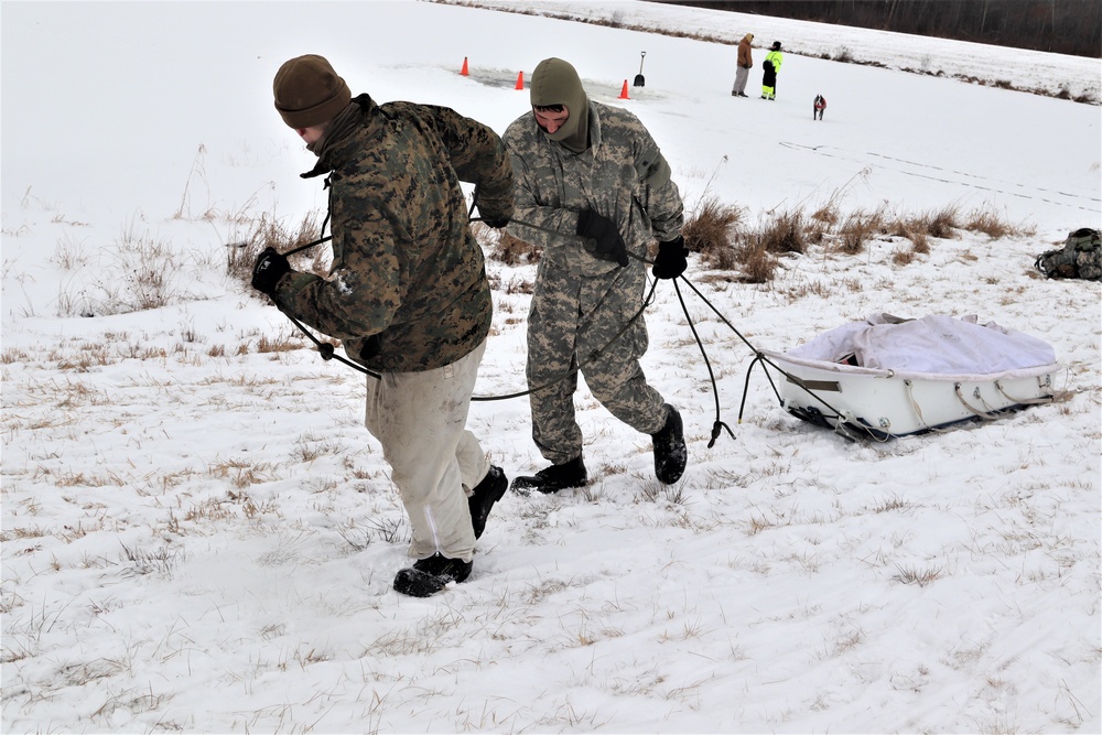 CWOC students practice cold-water immersion training scenario at Fort McCoy
