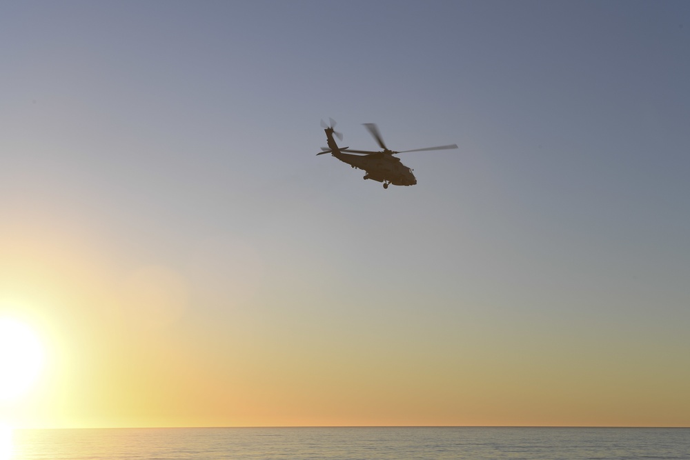 MH-60R Sea Hawk Helicopter Over The Pacific Ocean