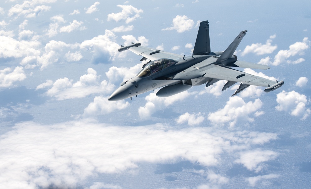 KC-135 Stratotanker refuels fighter aircraft during Cope North 2020