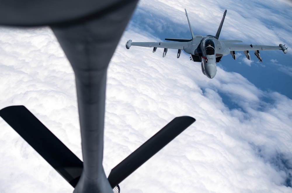 KC-135 Stratotanker refuels fighter aircraft during Cope North 2020