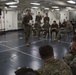 31st MEU Marines conduct a mission brief aboard USS America