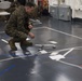 31st MEU Marines conduct a mission brief aboard USS America