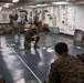 31st MEU Marines conduct a mission brief aboard USS America