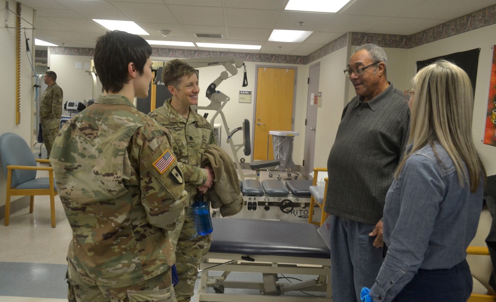 Military personnel ‘salute’ patients at VA medical center