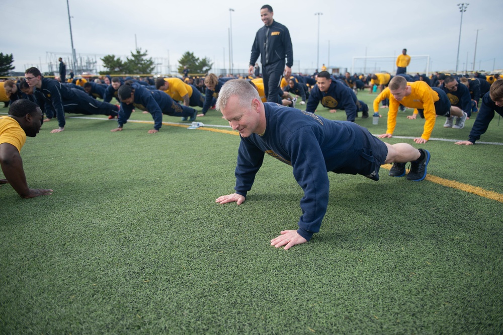 U.S. Navy Capt. Randy Peck, commanding officer of the aircraft carrier USS John C. Stennis (CVN 74), holds a plank during John C. Stennis' command physical training in Norfolk, Virginia, Jan. 31, 2020.