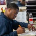 Sailors take care of paper work