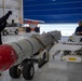 Sailors assigned to Patrol Squadron 46 Load ordnance