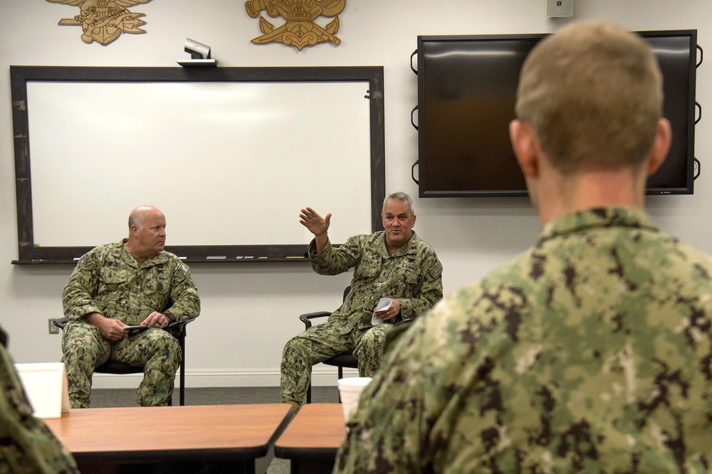Rear Adm. Collin Green and Force Master Chief Bill King speak to junior officers and senior enlisted leaders during a troop leadership class at The Center for SEAL and SWCC.