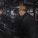 Sailors change settings on a hydraulic power unit