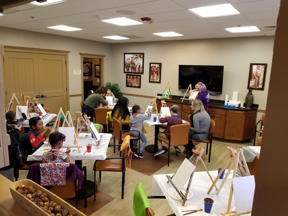 Children paint during Feb. 7 Fort Riley event