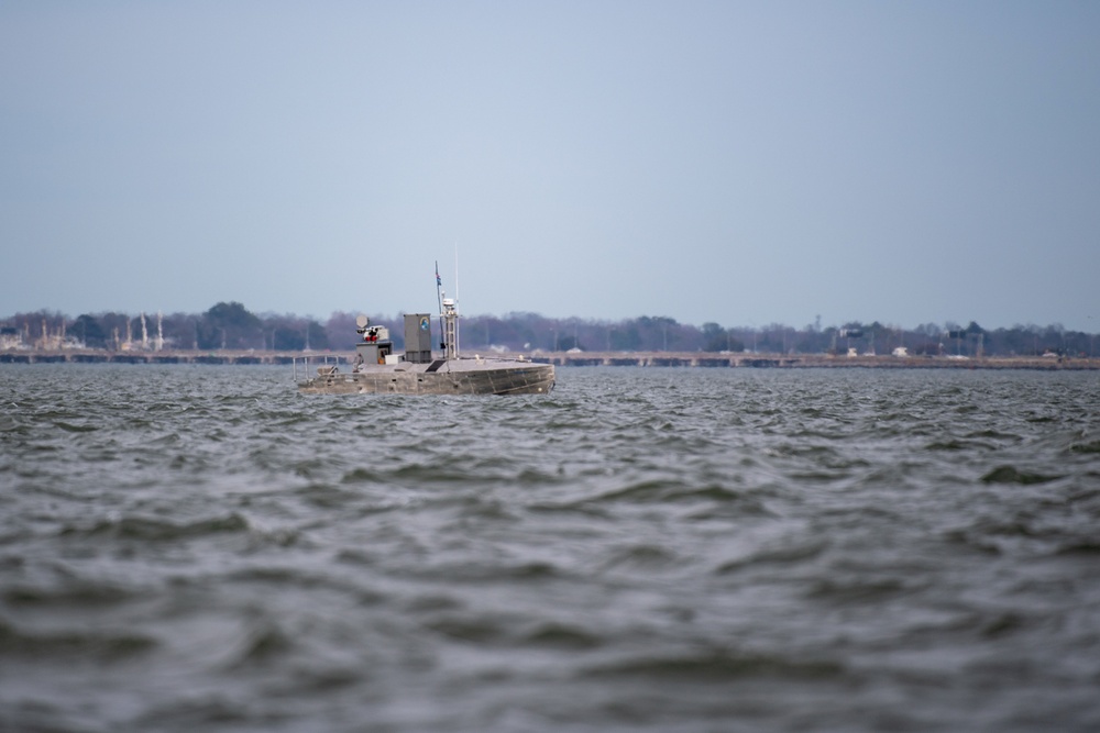 A developmental, early variant of the Common Unmanned Surface Vehicle (CUSV) autonomously conducts maneuvers