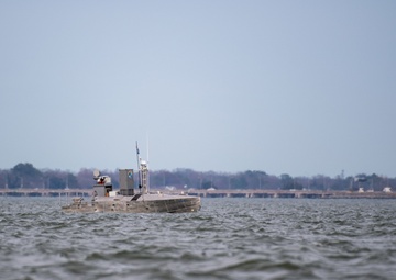 A developmental, early variant of the Common Unmanned Surface Vehicle (CUSV) autonomously conducts maneuvers