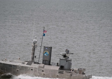 A developmental, early variant of the Common Unmanned Surface Vehicle (CUSV) autonomously conducts maneuvers