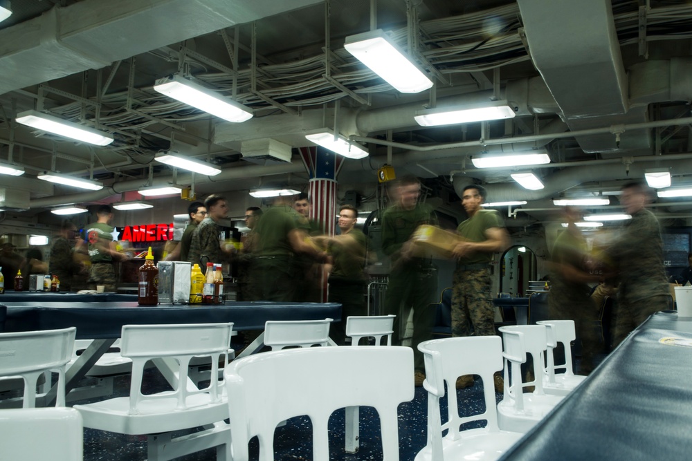 31st MEU Marines and Sailors conduct a replenishment at sea aboard USS America (LHA 6)