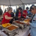 Volunteers Serve Food