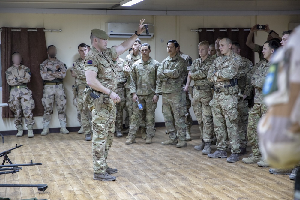 Coalition leads Professional Military Education briefing at Camp Taji