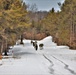 Fort McCoy Cold-Weather Operations Course Class 20-03 students practice snowshoeing, ahkio sled use