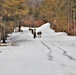 Fort McCoy Cold-Weather Operations Course Class 20-03 students practice snowshoeing, ahkio sled use