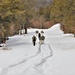 Fort McCoy Cold-Weather Operations Course Class 20-03 students practice snowshoeing, ahkio sled use