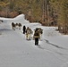 Fort McCoy Cold-Weather Operations Course Class 20-03 students practice snowshoeing, ahkio sled use