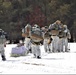 Fort McCoy Cold-Weather Operations Course Class 20-03 students practice snowshoeing, ahkio sled use