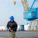 GHWB Sailor Cleans Flight Deck