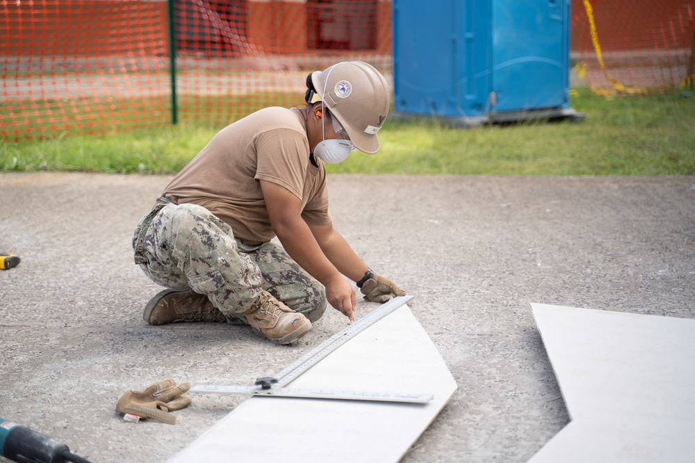 U.S. Navy Seabees with NMCB-5’s Detail Pohnpei continue construction on Sokehs Elementary School