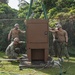 U.S. Navy Seabees with NMCB-5 replace a generator with 18th Civil Engineer Squadron