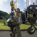 U.S. Navy Seabees with NMCB-5 replace a generator with 18th Civil Engineer Squadron