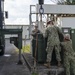 U.S. Navy Seabees with NMCB-5 replace a transformer at Kadena Airbase