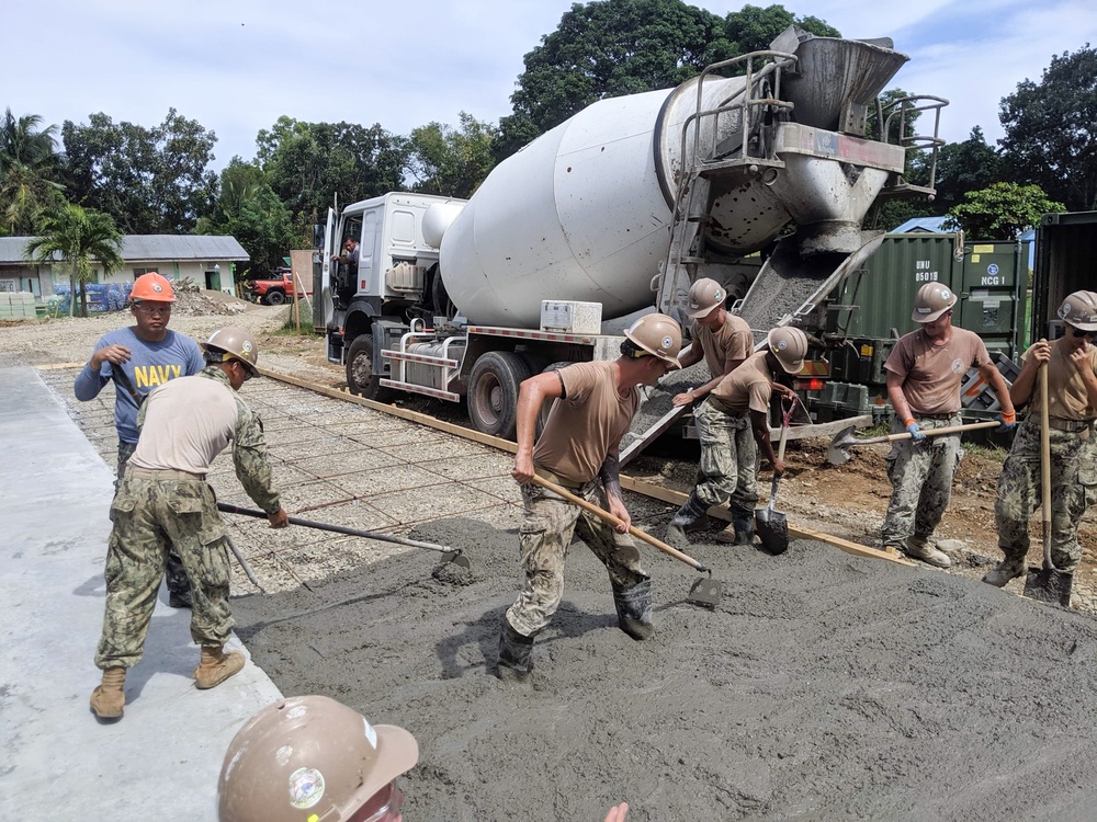 U.S. Navy Seabees deployed with NMCB-5’s Detail Palawan continue construction on Malatgao Elementary School