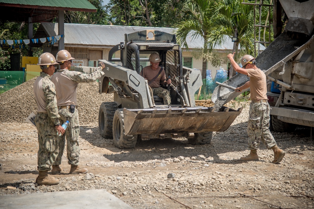 U.S. Navy Seabees deployed with NMCB-5’s Detail Palawan continue construction on Malatgao Elementary School