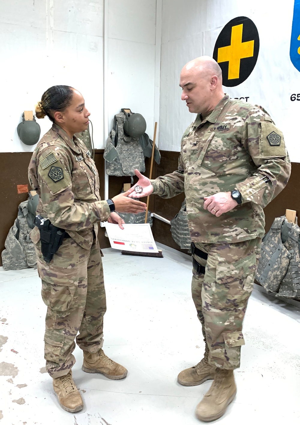 Deployed Illinois Soldier awarded the Commander’s Coin of Excellence