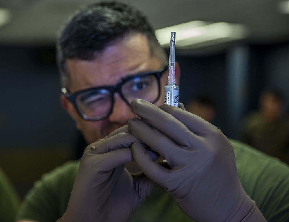 Field Medical Training Battalion practices intravenous needle administration