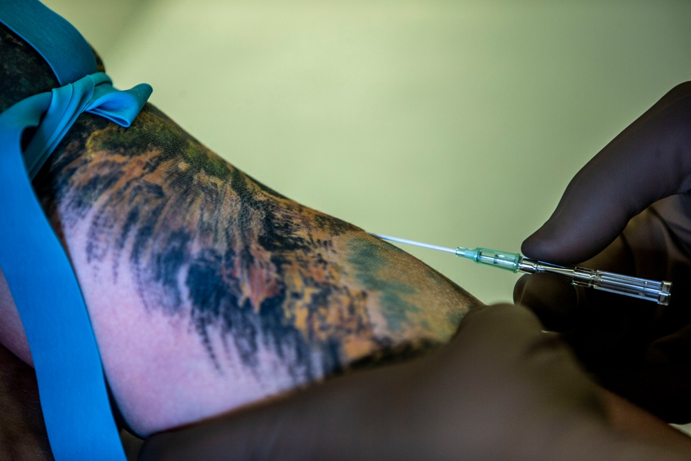 Field Medical Training Battalion practices intravenous needle administration