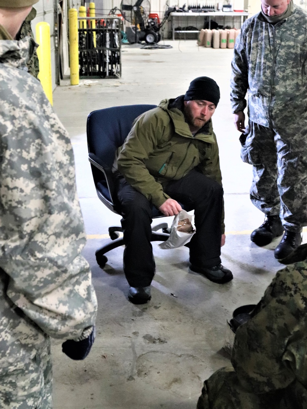 Cold-Weather Operations Course Class 20-03 students learn about equipment during training at Fort McCoy