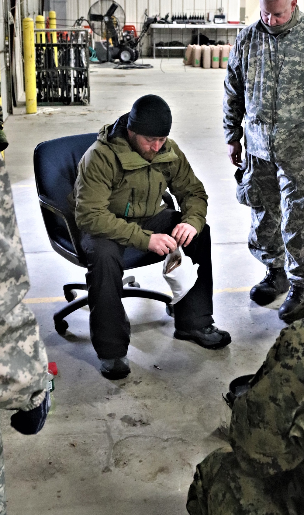 Cold-Weather Operations Course Class 20-03 students learn about equipment during training at Fort McCoy