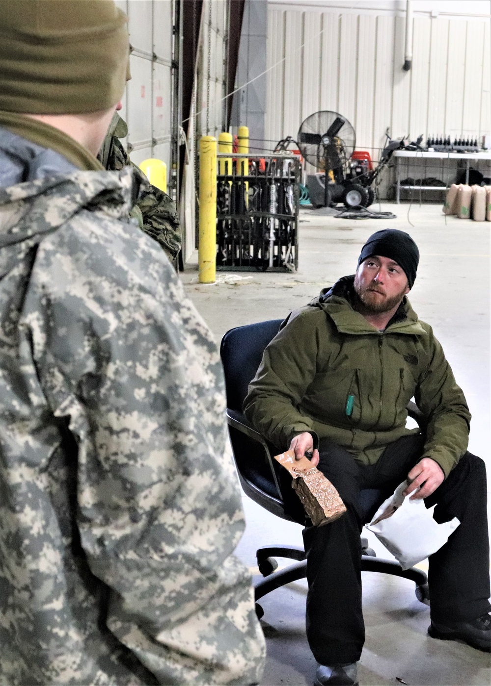 Cold-Weather Operations Course Class 20-03 students learn about equipment during training at Fort McCoy