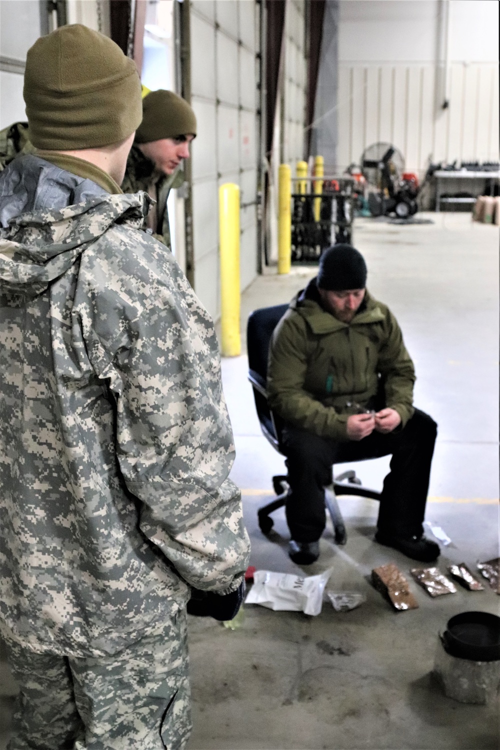 Cold-Weather Operations Course Class 20-03 students learn about equipment during training at Fort McCoy