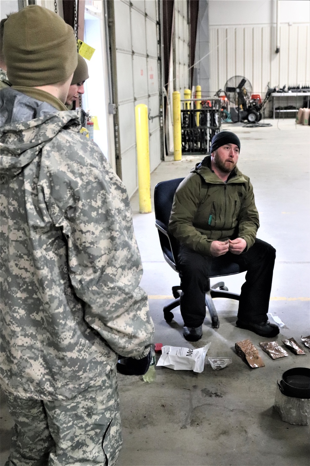 Cold-Weather Operations Course Class 20-03 students learn about equipment during training at Fort McCoy