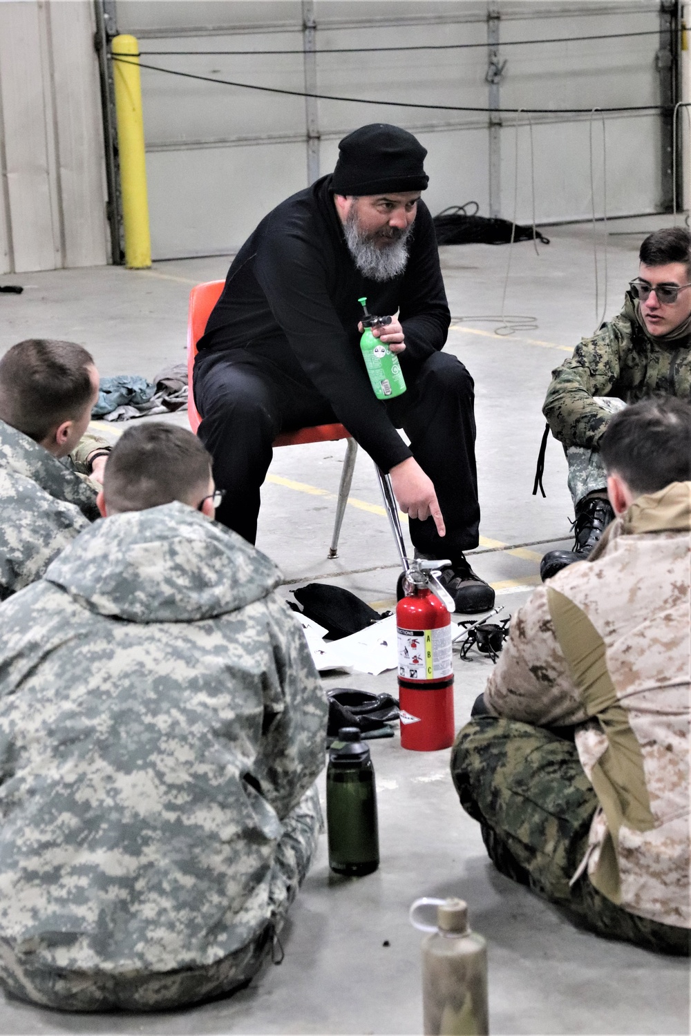 Cold-Weather Operations Course Class 20-03 students learn about equipment during training at Fort McCoy